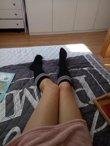 Legs in Knee Socks Bed Selfie