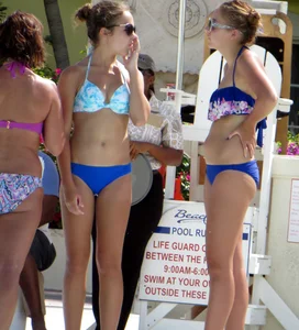 Stills of a beautiful blue eyed bikini babe in blue top