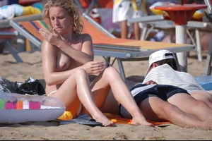 Girls on a nude beach in Bibione, Italy