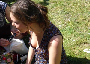 2 sexy girls showing nice cleavage while sitting together