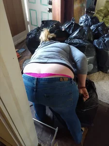 Chubby wife in tight jeans with pink whale tail panties bending over while collecting trash home creepshot