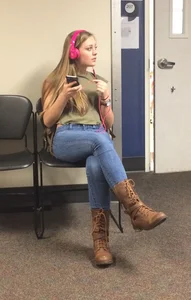 Very cute candid teen in tight jeans and boots sitting with crossed legs creepshot