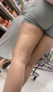Petite girl in teal shorts