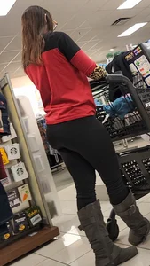Brunette with a tight butt, boots, and a VPL