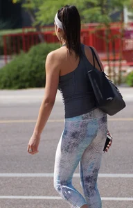 Flat ass brunette walking in leggings with big boobs