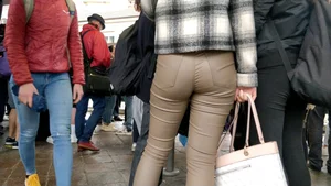 College girl in brown leather pants