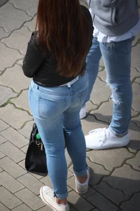 Pretty redhead in tight jeans with a nice booty