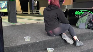 Sexy candid British redhead showing her red thong panties in cheap see through leggings