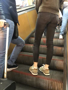 Girl with Thin Legs and Very Nice Flat Booty in Black Jeans at the Subway Escalator Creepshots
