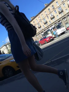 Girl in a Skirt With Sexy Skinny Legs Walking Down a Street Creepshots Collection