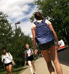 Hot college girl in little jean shorts showing some cheeks and legs