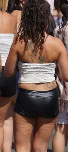 Girl out in tiny little leather shorts with a decent ass