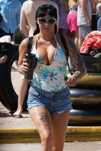 Girls in bikinis getting ready for tubing