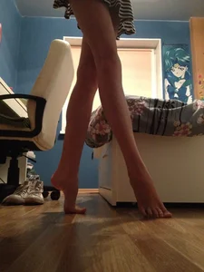 Girl with Skinny Legs Standing on Tiptoes with Bare Feet Home Selfie