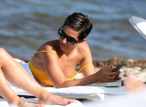 Frankie Bridge nip slips in a bikini on the beach