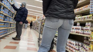 Sexy Asian girl grocery shopping in tight jeans with a nice ass
