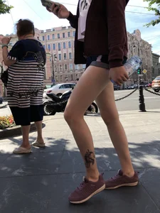 Amazing Thin Tattooed Legs in Denim Mini-Shorts Street Candid Photos Gallery