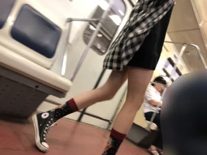 Cute Skinny Teen in Knee-Socks And Shorts Sitting With Crossed Legs in a Subway Train Creepshots Gallery