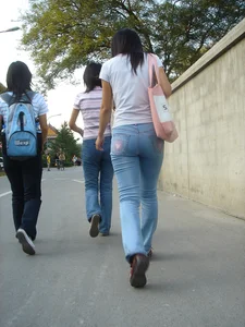 Cute Asian girl with a nice booty in tight jeans