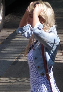 Hot blonde girl in tight blue leggings with nice ass