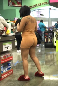 Latina with hard nipples and a big booty in tight spandex shorts outfit