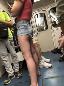 Gorgeous Legs And Butt in Denim Shorts And Feet in Sandals - Creepshots Gallery in a Subway Train and on an Escalator