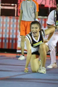 Bunch of athletic Thai cheerleaders at a competition