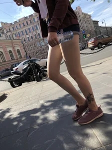 Amazing Thin Tattooed Legs in Denim Mini-Shorts Street Candid Photos Gallery