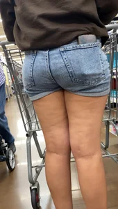 Cutie in shorts. Lil booty sits nicely