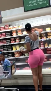 Big black milf booty in see through pink spandex shorts