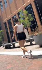 Curly Campus Brunette with amazing Bubble Butt in Tight Shorts (oc)