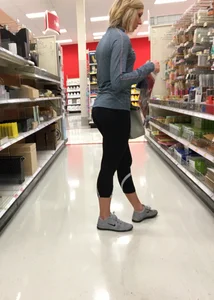 Blonde milf with a great ass shopping in leggings