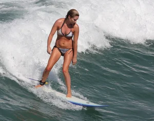 Candid surfer babes on the beach and in bikinis