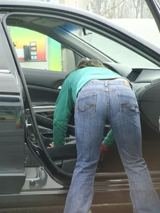 Girls cleaning their cars in jeans and pants