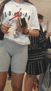 Amazing girl in grey spandex shorts at the mall, closeups of her firm hot ass and her crotch