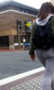 College girl in striped leggings walking with nice ass