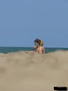 Sexy girls going topless at the beach showing off their sexy bodies