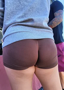 Tight ass Asian in brown shorts