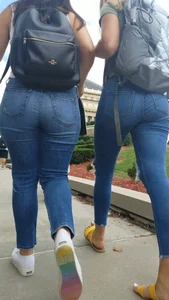 Two girls with nice asses walking in tight jeans