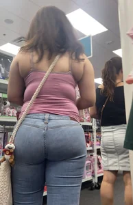 Thick Latina with a sweet ass in pocketless jeans w/slight VTL