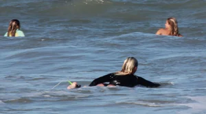 Hot surfer chicks out in the water