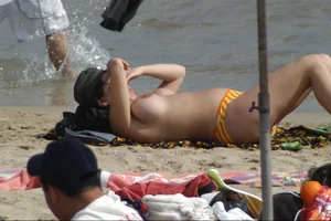 Girls on a nude beach in Sitges, Spain