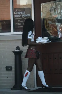 Sexy ebony Tilted Kilt employee in her uniform