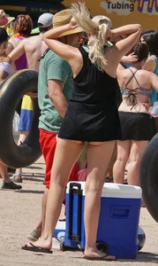 Girls in bikinis getting ready for tubing