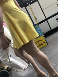 Hot blonde candid chick wearing a yellow dress street creepshots