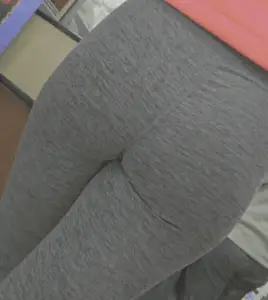 Banger Latina in dark grey leggings and glasses.( close up/ GIF)