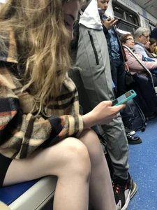 Very cute candid girl with very pale skin sitting in a subway train creepshots