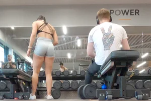 Gym brunette in tight grey shorts bending over, part 3