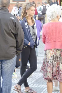 Pretty curly haired girl in tight leggings