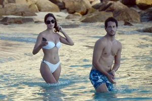 Iris Mittenaere in a white thong bikini on the beach in St Martin